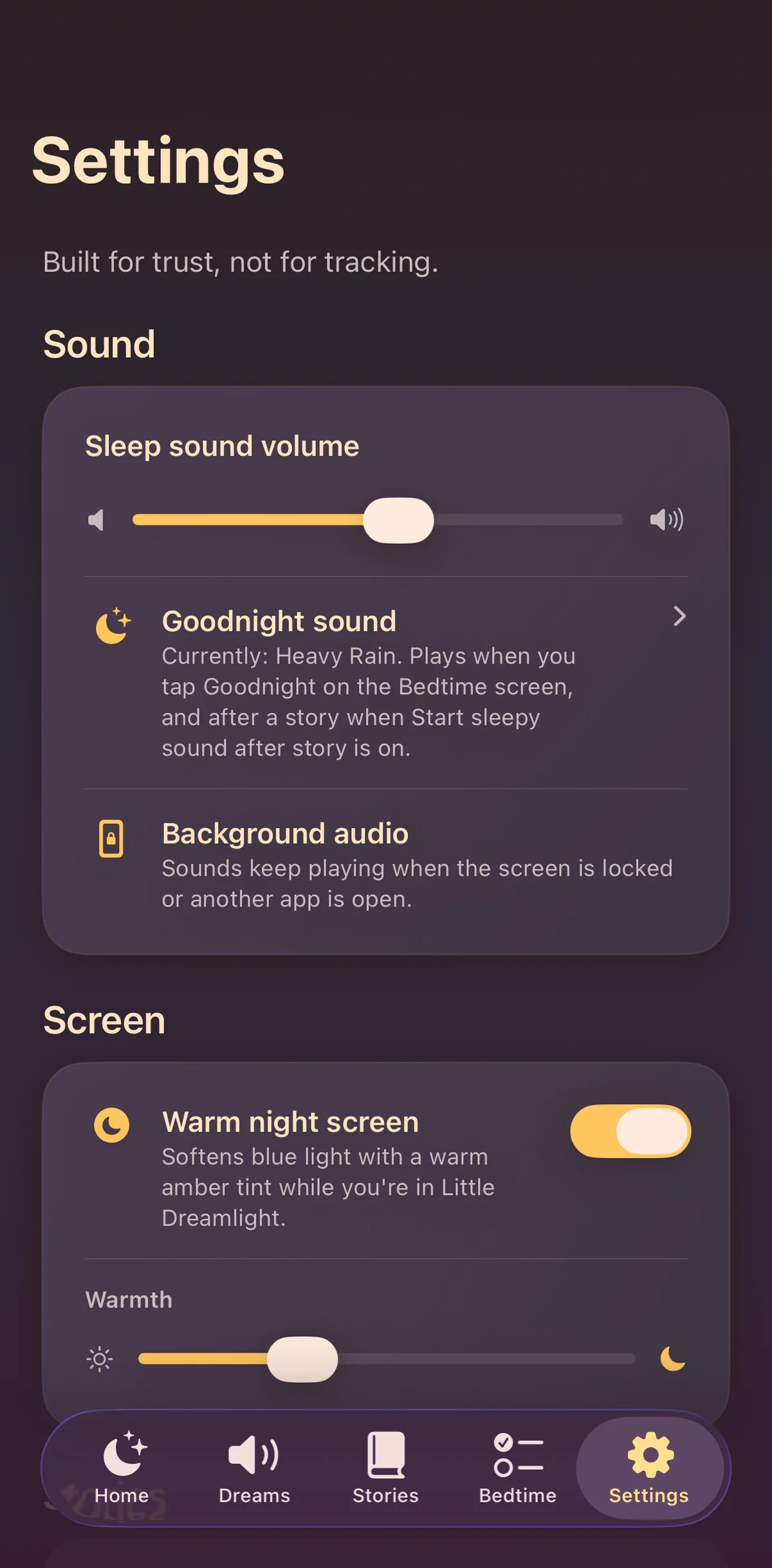 Little Dreamlight Settings with “Warm night screen” toggle on and the Warmth slider mid-deep, a soft amber tint washing the whole app view
